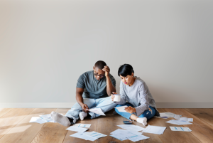 stressed-couple-figuring-out-their-finances